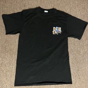 Black, orange, and blue vintage Santa Cruz skateboarding tee